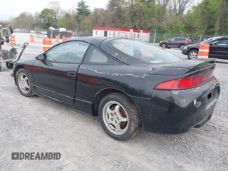 1997 Mitsubishi Eclipse with VIN 4A3AK44Y1VE042951, listed as a IAAI auction lot 42103920 with 119,268 mi miles and . Bid and sale history available at DreamBid. Image 3.