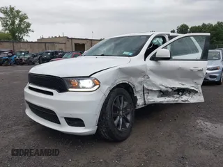 2014 Dodge Durango SXT with VIN 1C4RDJAG0EC561950, listed as a IAAI auction lot 42650331 with 106,959 mi miles and . Bid and sale history available at DreamBid. Image 18.