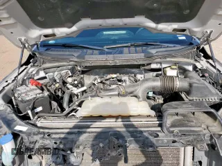 2023 Ford F-150 XL with VIN 1FTEW1CP0PKD18024, listed as a Copart auction lot 64282415 with 96,095 mi miles and Salvage title. Bid and sale history available at DreamBid. Image 11.