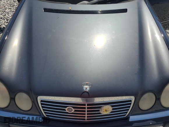 1998 Mercedes-Benz E with VIN WDBJF82F4WX012153, listed as a Copart auction lot 51848665 with 121,867 mi miles and Salvage Title. Bid and sale history available at DreamBid. Image 11.
