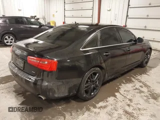 2015 Audi A6 2.0T Premium Plus with VIN WAUGFAFC7FN012983, listed as a IAAI auction lot 41086404 with 145,358 mi miles. Bid and sale history available at carsss.com. Image 4.