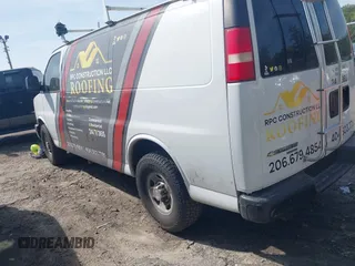2014 Chevrolet Express Cargo Van with VIN 1GCWGFCA8E1199409, listed as a IAAI auction lot 41936092 with 304,367 mi miles. Bid and sale history available at carsss.com. Image 3.