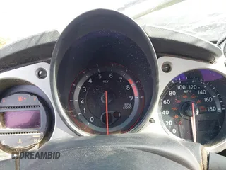 2013 Nissan 370Z z VIN JN1AZ4EH2DM380511, wystawiony jako IAAI lot #41912193 z przebiegiem Nie podano mil oraz . Historia ofert i sprzedaży dostępna na DreamBid. Obrazek 7.