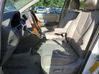 2001 Lexus RX 300 with VIN JTJHF10U310197352, listed as a Copart auction lot 53734165 with 215,879 mi miles and Clean Title. Bid and sale history available at DreamBid. Image 7.
