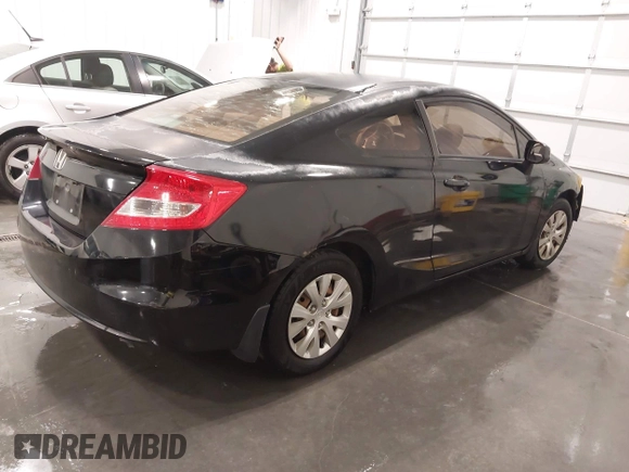 2012 Honda Civic Cpe LX with VIN 2HGFG3B55CH559433, listed as a IAAI auction lot 42045526 with 152,159 mi miles. Bid and sale history available at carsss.com. Image 4.