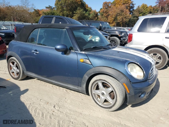 2009 MINI Cooper Convertible with VIN WMWMR33559TU96728, listed as a Copart auction lot 77949004 with 86,084 mi miles and Clean Title. Bid and sale history available at carsss.com. Image 4.