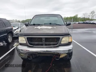 2003 Ford F-150 XLT with VIN 1FTRW08L43KD25506, listed as a IAAI auction lot 41941847 with 1 mi miles. Bid and sale history available at carsss.com. Image 12.