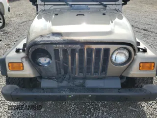 2003 Jeep Wrangler X с VIN 1J4FA39S03P349713, выставлен на аукционе Copart как лот 55768995 с пробегом 187 266 миль миль и Списание • Salvage title. История ставок и продаж доступна на DreamBid. Изображение 11.