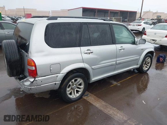 2004 Suzuki XL-7 LX with VIN JS3TY92VX44102960, listed as a IAAI auction lot 41559160 with 134,029 mi miles. Bid and sale history available at carsss.com. Image 4.