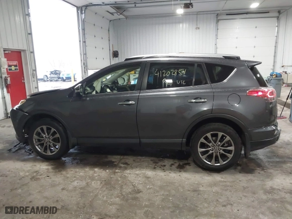 2018 Toyota RAV4 Limited with VIN JTMDFREV7JJ212799, listed as a IAAI auction lot 41202854 with 120,705 mi miles. Bid and sale history available at carsss.com. Image 14.