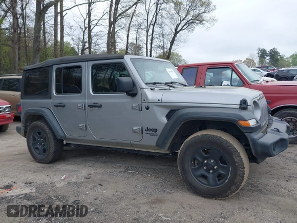 2021 Jeep Wrangler Unlimited Sport S with VIN 1C4HJXDN3MW717266, listed as a IAAI auction lot 41940869 with 113,386 mi miles. Bid and sale history available at carsss.com. Image 13.