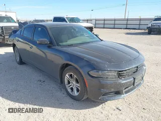 2019 Dodge Charger SXT with VIN 2C3CDXBG2KH658121, listed as a IAAI auction lot 41781901 with 125,634 mi miles. Bid and sale history available at carsss.com. Image 1.