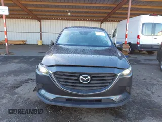 2018 Mazda CX-9 Sport z VIN JM3TCABY8J0203093, wystawiony jako IAAI lot #41218241 z przebiegiem 130 832 mil mil oraz . Historia ofert i sprzedaży dostępna na DreamBid. Obrazek 13.