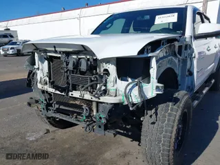 2017 Toyota Tacoma SR5 with VIN 3TMDZ5BN3HM023813, listed as a IAAI auction lot 41522828 with 128,533 mi miles. Bid and sale history available at carsss.com. Image 6.