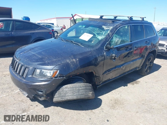 2014 Jeep Grand Cherokee Laredo with VIN 1C4RJEAG0EC580675, listed as a IAAI auction lot 41773879 with 127,714 mi miles. Bid and sale history available at carsss.com. Image 2.