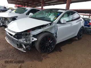 2022 Tesla Model Y Performance with VIN 7SAYGDEF4NF449986, listed as a IAAI auction lot 41754916 with 64,384 mi miles and . Bid and sale history available at DreamBid. Image 22.