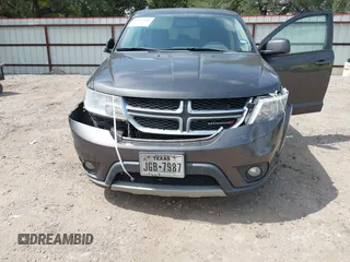 2017 Dodge Journey SXT z VIN 3C4PDCBB9HT507917, wystawiony jako IAAI lot #42322823 z przebiegiem 131 011 mil mil oraz . Historia ofert i sprzedaży dostępna na DreamBid. Obrazek 6.