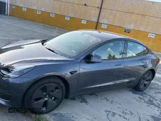 2023 Tesla Model 3 with VIN 5YJ3E1EA1PF607137, listed as a Copart auction lot 62613375 with 27,271 mi miles and Clean title. Bid and sale history available at DreamBid. Image 2.