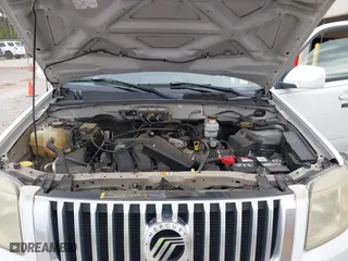 2008 Mercury Mariner Premier with VIN 4M2CU87118KJ11472, listed as a IAAI auction lot 42063566 with 128,274 mi miles. Bid and sale history available at carsss.com. Image 10.