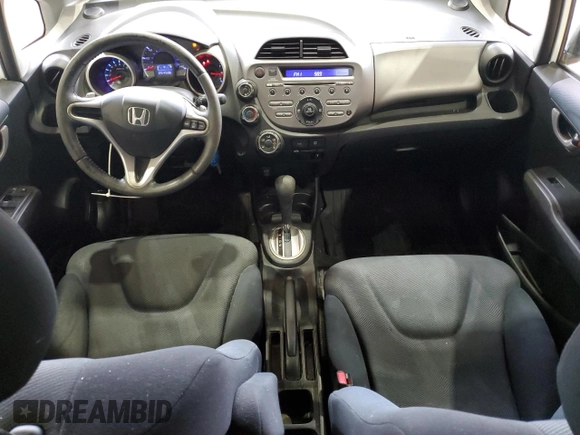 2009 Honda Fit Sport with VIN JHMGE88419S026712, listed as a Copart auction lot 51165865 with 54,586 mi miles and Salvage Title. Bid and sale history available at carsss.com. Image 8.