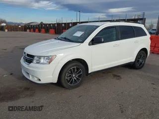 2017 Dodge Journey SE with VIN 3C4PDCAB6HT670624, listed as a IAAI auction lot 41777947 with 143,496 mi miles and . Bid and sale history available at DreamBid. Image 2.