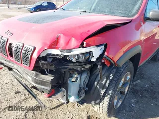 2019 Jeep Cherokee Trailhawk Elite with VIN 1C4PJMBX3KD217437, listed as a IAAI auction lot 41448614 with 85,889 mi miles. Bid and sale history available at carsss.com. Image 6.