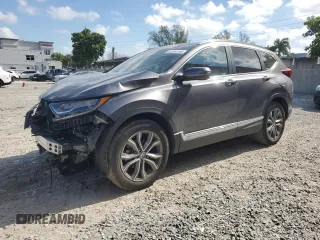 2020 Honda CR-V Touring with VIN 2HKRW2H96LH677520, listed as a Copart auction lot 52264155 with 33,909 mi miles and Salvage Title. Bid and sale history available at carsss.com. Image 1.