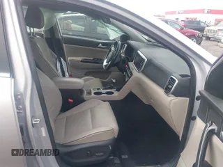 2020 Kia Sportage EX with VIN KNDPN3AC9L7775192, listed as a IAAI auction lot 41020011 with 60,652 mi miles and . Bid and sale history available at DreamBid. Image 5.