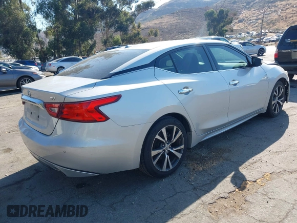 2017 Nissan Maxima Platinum with VIN 1N4AA6AP2HC414204, listed as a IAAI auction lot 42394624 with 80,486 mi miles and . Bid and sale history available at DreamBid. Image 4.
