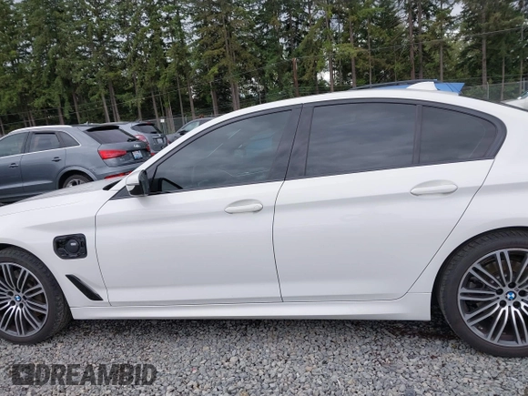 2019 BMW 5 Series 530e with VIN WBAJA9C57KB389401, listed as a IAAI auction lot 42565098 with 52,343 mi miles and . Bid and sale history available at DreamBid. Image 15.