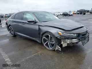 2018 Honda Accord Sedan Sport 1.5T with VIN 1HGCV1F37JA178989, listed as a IAAI auction lot 41209303 with 145,928 mi miles. Bid and sale history available at carsss.com. Image 1.