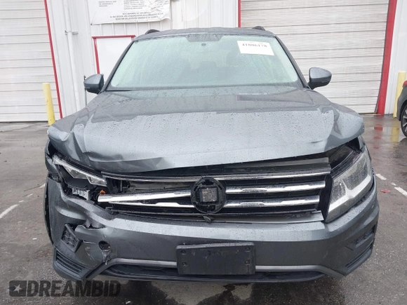 2020 Volkswagen Tiguan S z VIN 3VV1B7AX7LM129259, wystawiony jako IAAI lot #41806178 z przebiegiem 48 953 mil mil oraz . Historia ofert i sprzedaży dostępna na DreamBid. Obrazek 12.