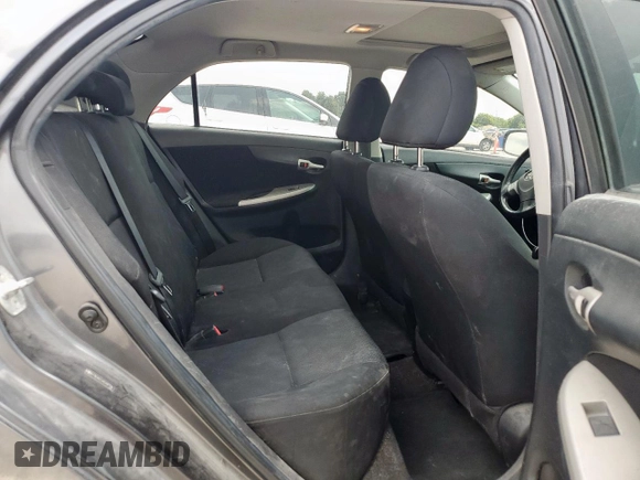 2010 Toyota Corolla z VIN 2T1BU4EE2AC497519, wystawiony jako Copart lot #64614915 z przebiegiem 183 890 mil mil oraz Szkoda całkowita • Salvage title. Historia ofert i sprzedaży dostępna na DreamBid. Obrazek 10.