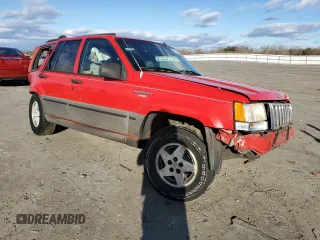1994 Jeep Grand Cherokee Laredo с VIN 1J4GZ58S1RC119463, выставлен на аукционе Copart как лот 48240315 с пробегом 126 826 миль миль и Списание • Salvage title. История ставок и продаж доступна на DreamBid. Изображение 4.