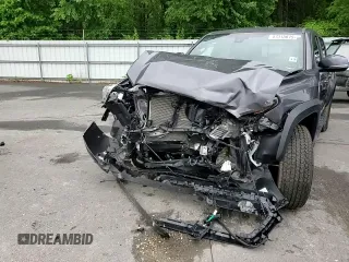 2021 Toyota Tacoma SR z VIN 3TYCZ5ANXMT050566, wystawiony jako Copart lot #57315615 z przebiegiem Nie podano mil oraz Szkoda całkowita • Salvage title. Historia ofert i sprzedaży dostępna na DreamBid. Obrazek 14.