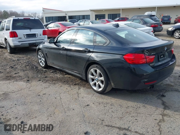2016 BMW 4 Series 428i xDrive with VIN WBA4C9C52GG136584, listed as a IAAI auction lot 41530110 with 124,667 mi miles and . Bid and sale history available at carsss.com. Image 3.