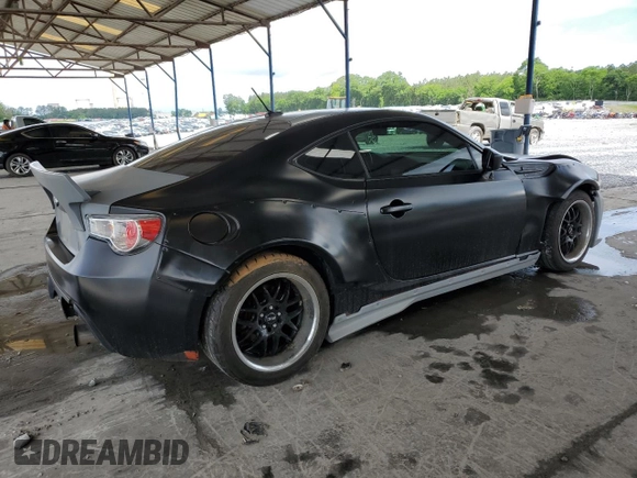 2014 Subaru BRZ Limited с VIN JF1ZCAC14E9601722, выставлен на аукционе Copart как лот 56002685 с пробегом 76 859 миль миль и Списание • Salvage title. История ставок и продаж доступна на DreamBid. Изображение 3.