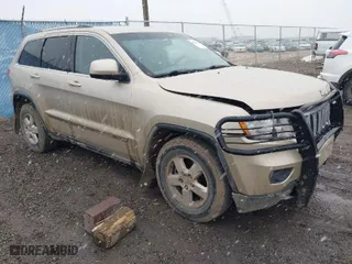 2011 Jeep Grand Cherokee Laredo with VIN 1J4RR4GG9BC563065, listed as a IAAI auction lot 41798136 with 192,149 mi miles. Bid and sale history available at carsss.com. Image 1.