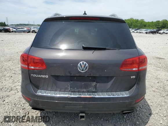 2013 Volkswagen Touareg Lux with VIN WVGEF9BP8DD002947, listed as a Copart auction lot 52590164 with 144,831 mi miles and Salvage Title. Bid and sale history available at DreamBid. Image 6.