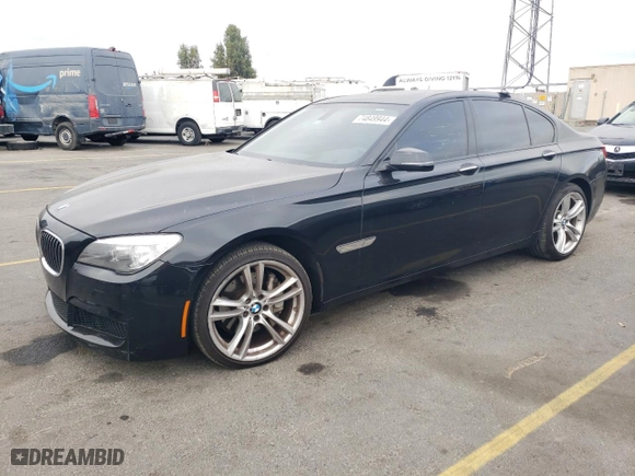 2015 BMW 7 Series 740i with VIN WBAYA6C50FGK16616, listed as a Copart auction lot 74849944 with 125,352 mi miles and Salvage Title. Bid and sale history available at carsss.com. Image 1.