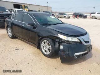 2009 Acura TL Tech with VIN 19UUA865X9A015128, listed as a IAAI auction lot 41984359 with 232,138 mi miles. Bid and sale history available at carsss.com. Image 1.