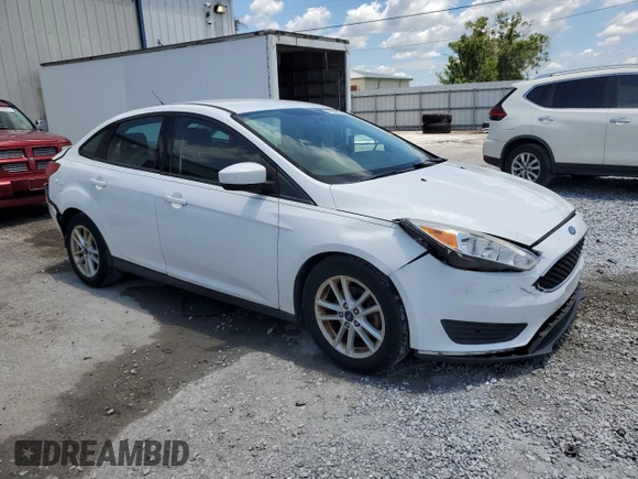 2018 Ford Focus SE with VIN 1FADP3F23JL245856, listed as a Copart auction lot 62343745 with 51,076 mi miles and Salvage title. Bid and sale history available at DreamBid. Image 4.