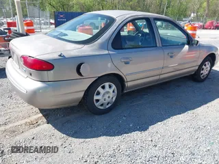 1995 Ford Contour LX with VIN 1FALP6530SK102135, listed as a IAAI auction lot 42103390 with 108,513 mi miles and . Bid and sale history available at DreamBid. Image 4.
