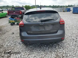 2017 Ford Focus Titanium z VIN 1FADP3N22HL307260, wystawiony jako Copart lot #61399785 z przebiegiem 103 293 mil mil oraz Szkoda całkowita • Salvage title. Historia ofert i sprzedaży dostępna na DreamBid. Obrazek 6.