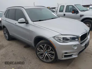 2015 BMW X5 sDrive35i with VIN 5UXKR2C54F0H40596, listed as a IAAI auction lot 41537212 with 174,543 mi miles. Bid and sale history available at carsss.com. Image 1.