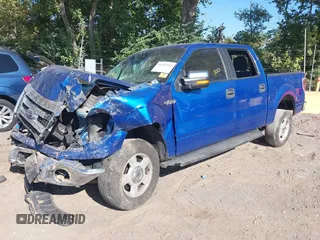 2014 Ford F-150 XL with VIN 1FTEW1CM7EKE11447, listed as a IAAI auction lot 40263342 with 136,589 mi miles. Bid and sale history available at carsss.com. Image 2.