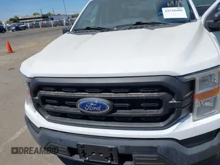 2021 Ford F-150 XL with VIN 1FTFW1CD1MFB31373, listed as a IAAI auction lot 42530409 with 119,956 mi miles and . Bid and sale history available at DreamBid. Image 6.