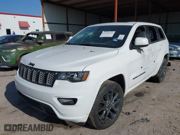 2020 Jeep Grand Cherokee Laredo E with VIN 1C4RJFAGXLC178892, listed as a IAAI auction lot 41998211 with 83,022 mi miles and . Bid and sale history available at DreamBid. Image 17.