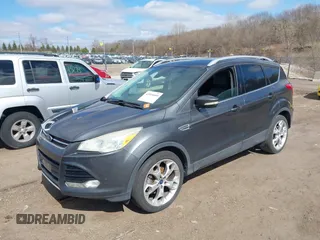 2015 Ford Escape Titanium with VIN 1FMCU0J91FUB74896, listed as a IAAI auction lot 41919609 with 135,363 mi miles. Bid and sale history available at carsss.com. Image 2.