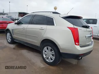 2015 Cadillac SRX z VIN 3GYFNAE37FS597695, wystawiony jako IAAI lot #42184666 z przebiegiem 106 210 mil mil oraz . Historia ofert i sprzedaży dostępna na DreamBid. Obrazek 3.